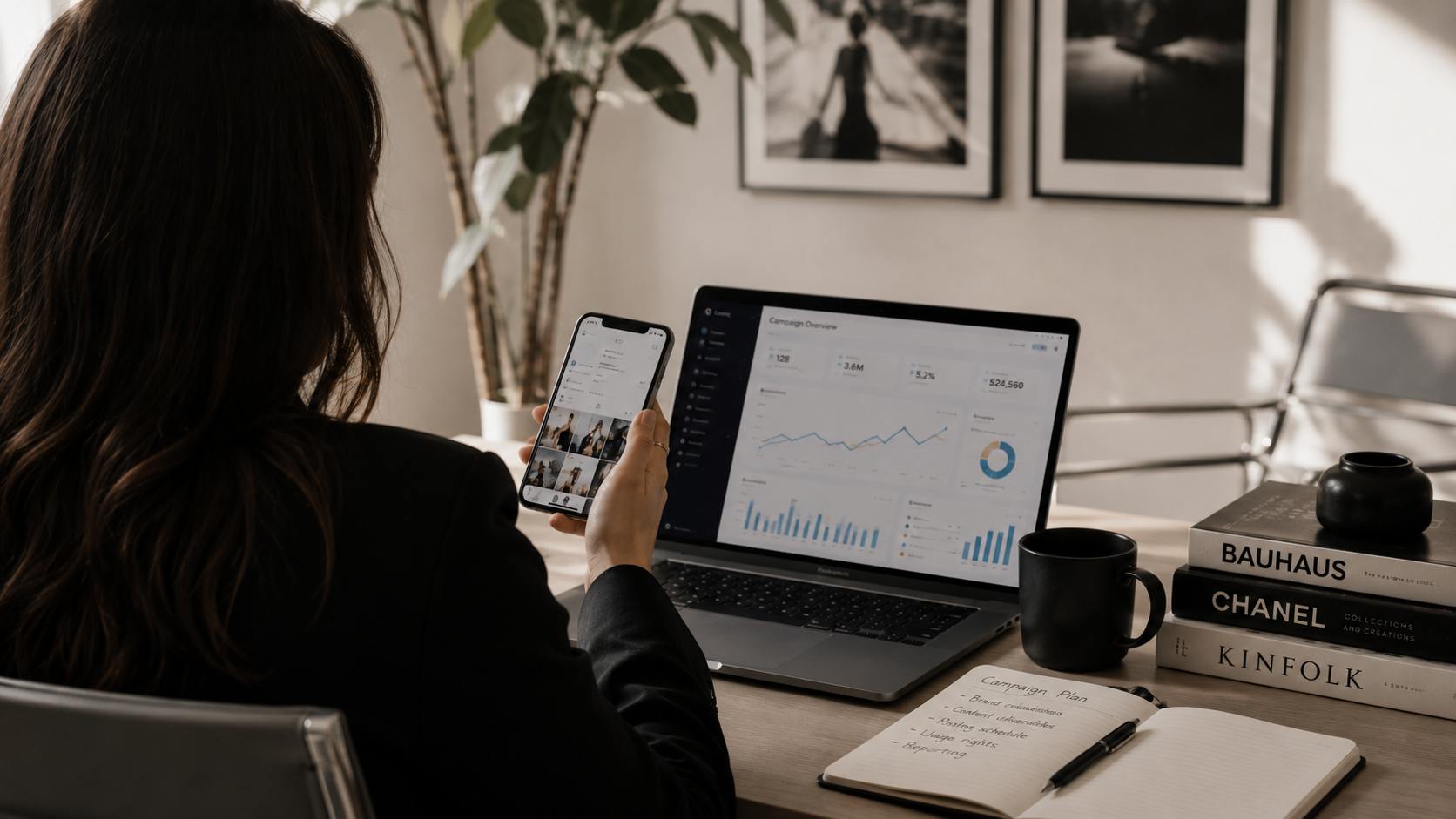 Creator reviewing campaign analytics on laptop and phone